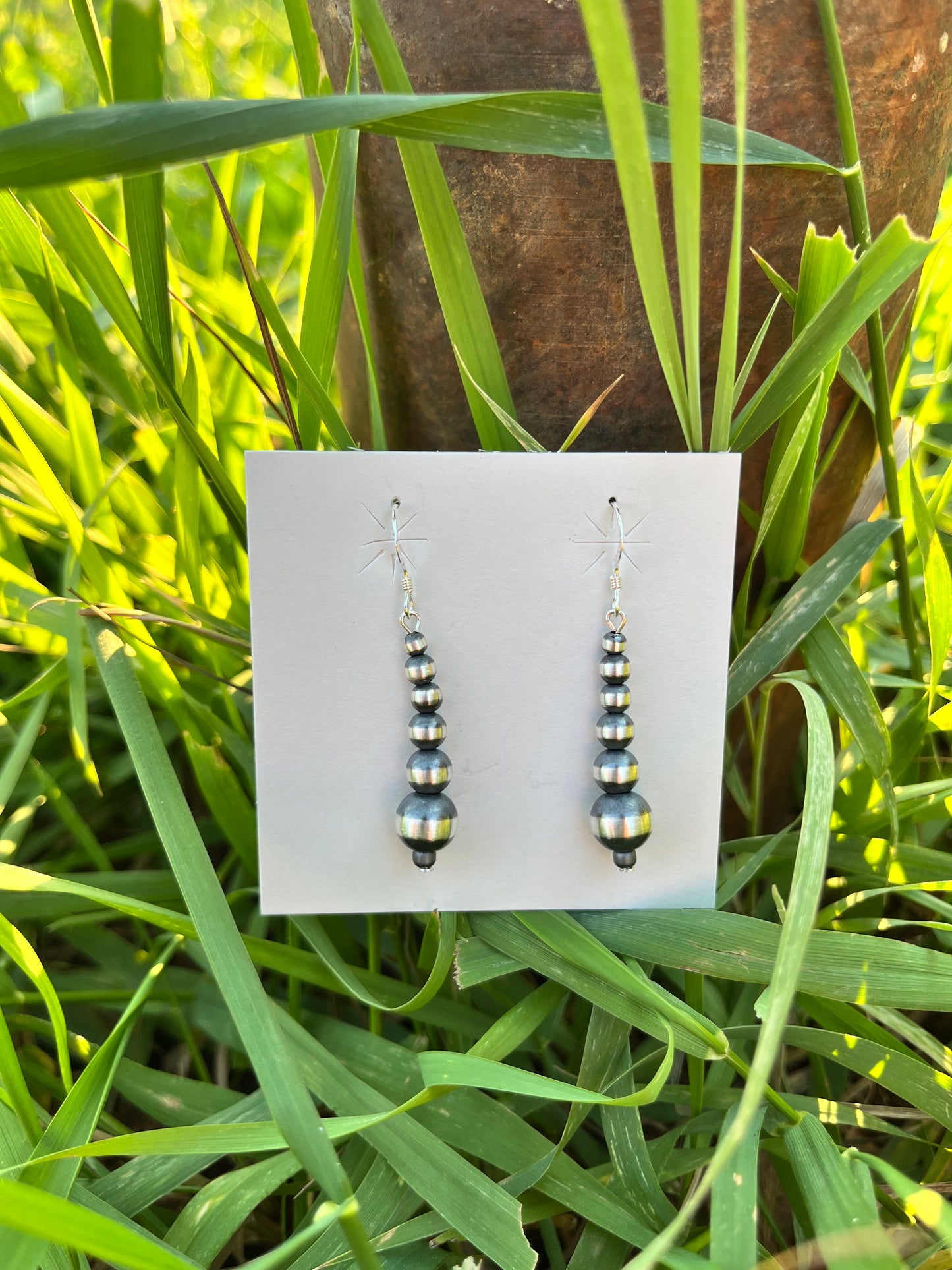 Graduated Pearl Drop Earrings