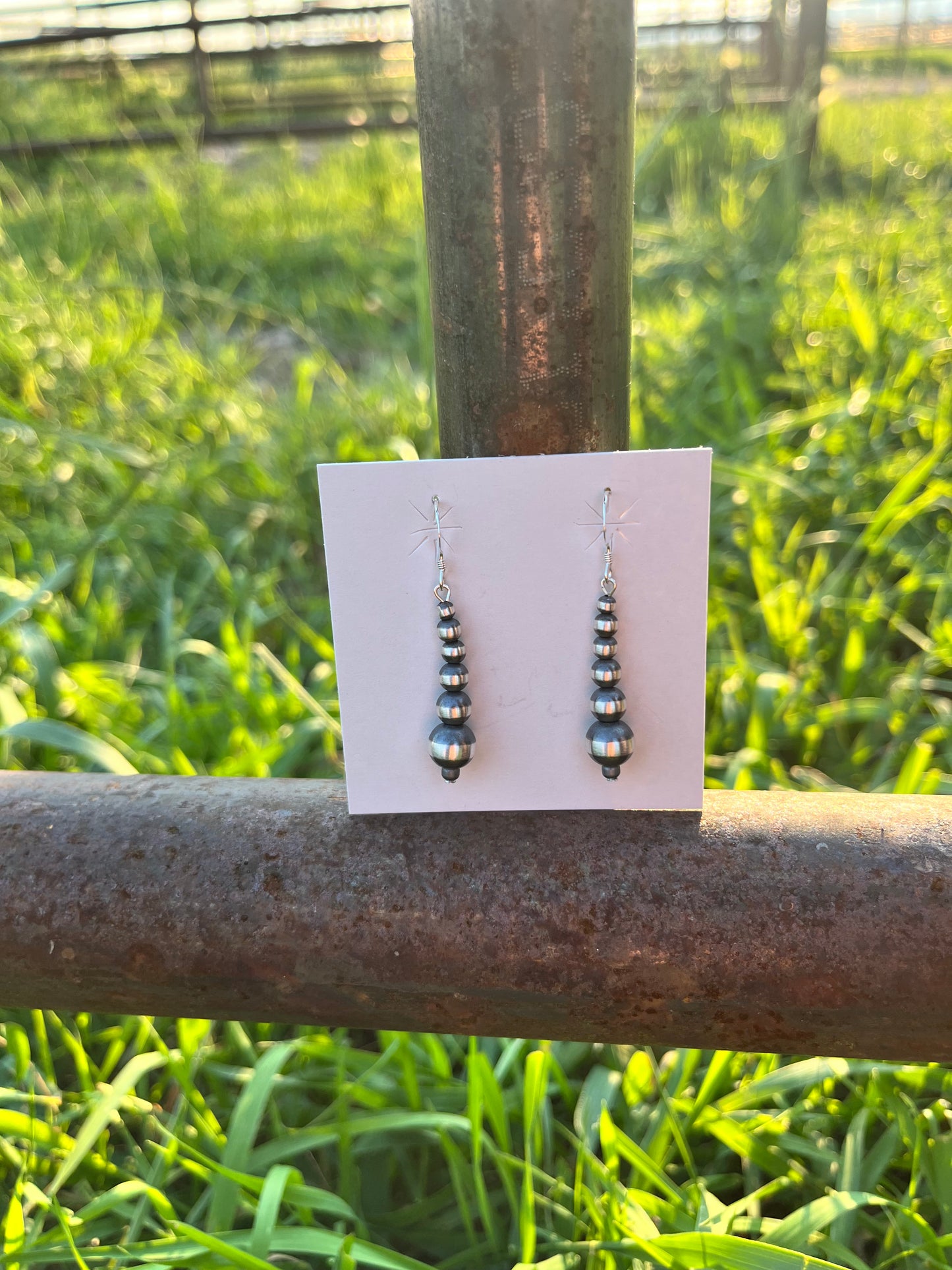 Graduated Pearl Drop Earrings