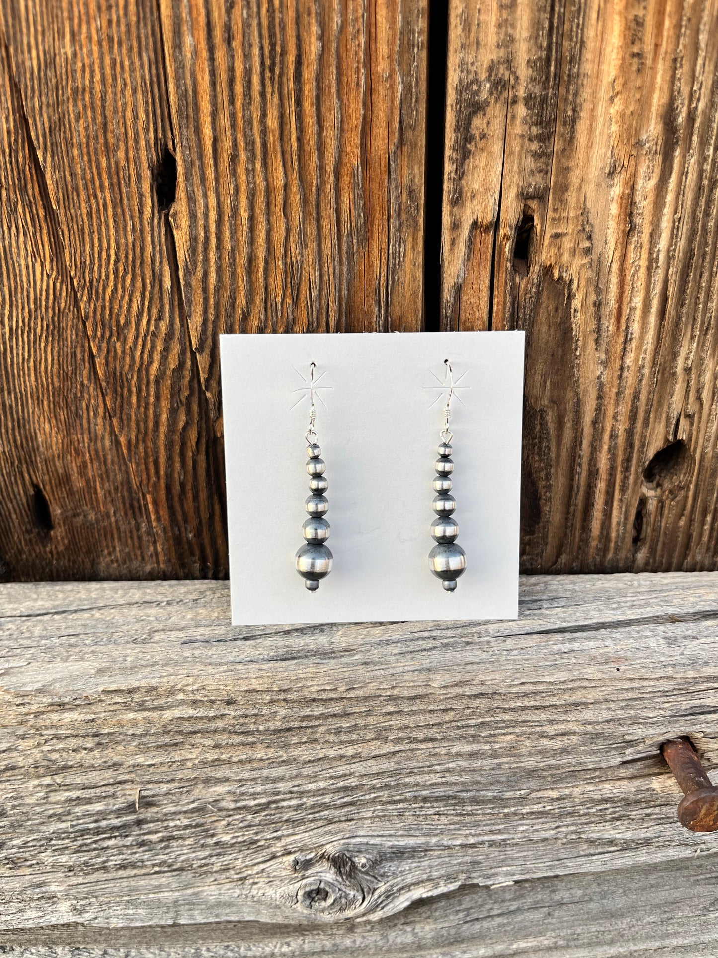 Graduated Pearl Drop Earrings